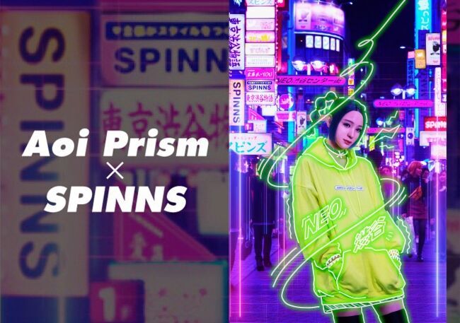 バーチャルギャル 葵プリズム が SPINNS 渋谷109店とコラボ。新商品「NEO渋谷センター街パーカー」が発売。の1枚目の画像