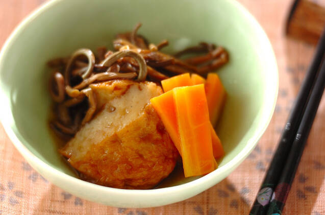 ゼンマイとさつま揚げ、にんじんをきれいに盛り付けた器