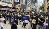 「中国の人権弾圧に声をあげない日本の政治家」の画像1