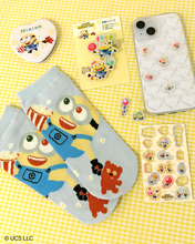 ミニオンの可愛らしいグッズが目白押し♪ ポップコーン片手にワクワクしているデザインのアイテムがALL390円で登場！