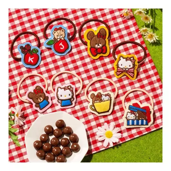 「ハローキティ×くまのがっこうの可愛いぬいゴムが登場♪ チョコボーロのおまけ付きで27年3月発売！」の画像
