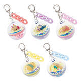 「ポムポムプリン、シナモンが砂浜ですやすや♪ 「サンリオ」こんがり日焼け姿がかわいいカプセルトイ「日焼けすやすやカプセルキーチェーン」登場」の画像1