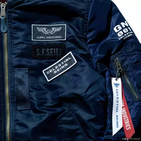 「「ガンダム00」刹那・F・セイエイモデルのMA-1も！ミリタリーブランド“ALPHA”コラボ登場」の画像