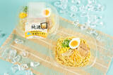 「やったね！ ファミマに「さっぽろ純連」監修の冷しラーメン　味噌×豚骨をチュルリ」の画像1