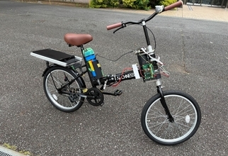 芝浦工業大学、「曲がりたい」と「転びそう」を見分ける電動バイク制御技術を開発　～運転者の意図を理解し、必要なときだけ転倒防止を支援～