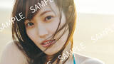 「櫻坂46・松田里奈、夕日に照らされたビーチで水着姿！　1st写真集『まつりの時間』封入特典第2弾カット解禁」の画像1