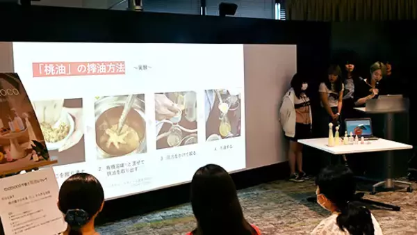 「【産学連携】2024年度 共立女子大学×東和エンジニアリング「春日居の桃をテーマに地域循環SDGsに向けた産学連携授業」の集大成となる完成発表会を開催」の画像