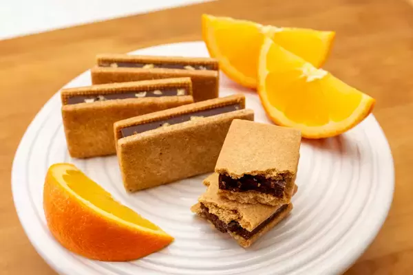 「【キル フェ ボン】＜新発売＞大人気の焼菓子、新フレーバー登場！爽やかなオレンジの果肉をとじ込めたガナッシュをたっぷりと。新作「Sandwich aux fruits ORANGE 」」の画像