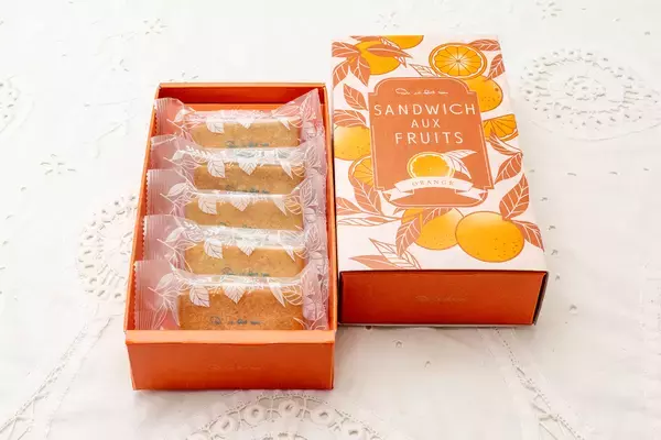 「【キル フェ ボン】＜新発売＞大人気の焼菓子、新フレーバー登場！爽やかなオレンジの果肉をとじ込めたガナッシュをたっぷりと。新作「Sandwich aux fruits ORANGE 」」の画像