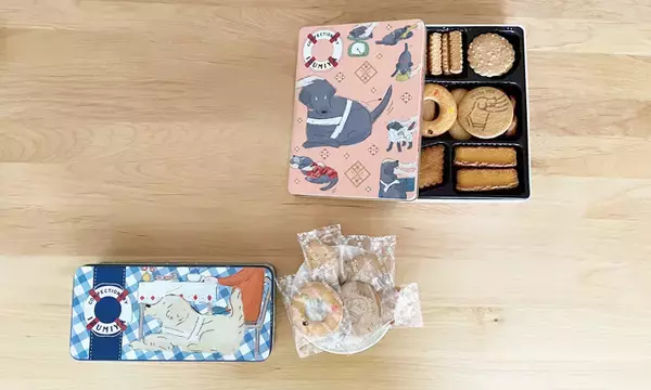 「【犬好きギフトの決定版】50,000缶販売の盲導犬チャリティークッキー缶に新デザイン登場。うれしい個包装も新発売でご自宅用にもオススメです。」の画像