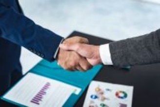 リコージャパンとネクスタが製造業のDX支援に向けて資本業務提携