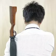 持つ人をスナイパーに見せてくれる傘