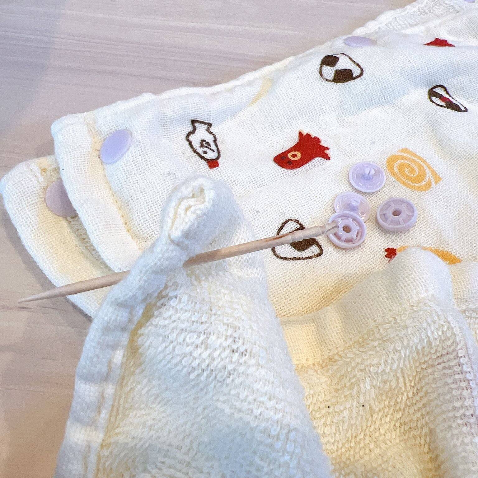 「縫わずに完成♪ハンドタオルで作る抱っこひも用よだれカバー」 by chanduさん