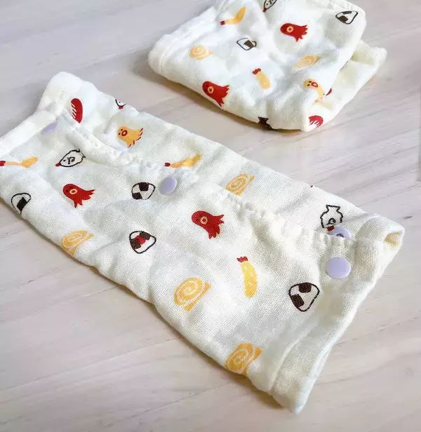 「「縫わずに完成♪ハンドタオルで作る抱っこひも用よだれカバー」 by chanduさん」の画像