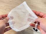「『メッシュの巾着』と思いきや？　ダイソーの「専用カバー」が夏のお出かけに役立つ！」の画像1