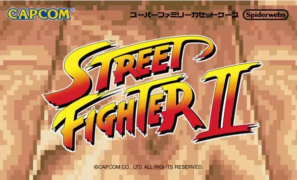 「タブーとされている“端子”部分を触り放題！『スト2』スーファミカセットケースが予約販売、ゲームシーンのように飾れる「リュウvs.ケン」などアクスタも付属」の画像