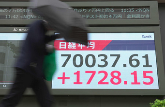 東京株、一時７万円回復