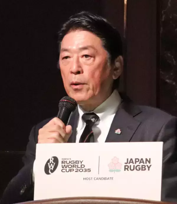 記者会見する土田会長