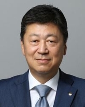 日経新聞社長に飯田氏