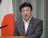 「消費減税の財源、為替差益否定」の画像1