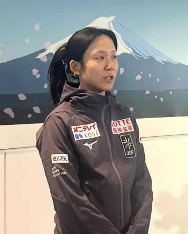 取材に応じる高木