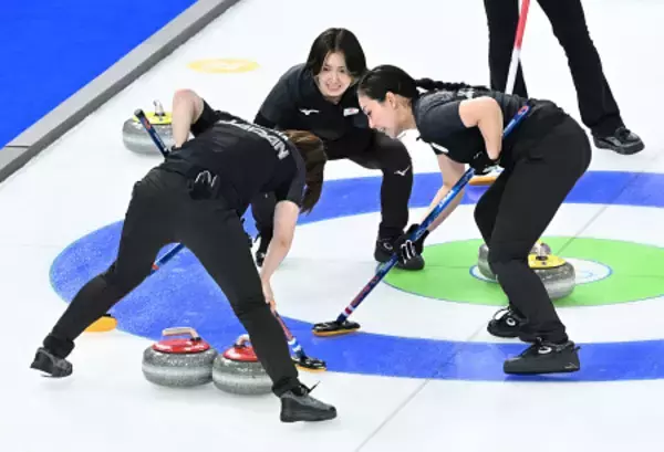 スイープする小野寺と近江谷　五輪