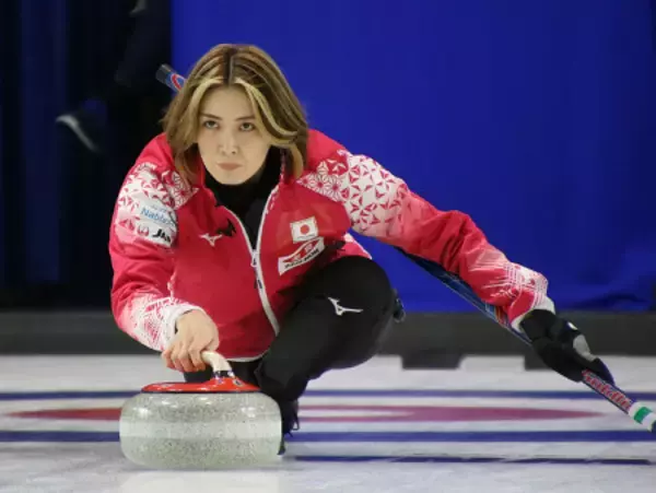 ストーンを投じる吉村