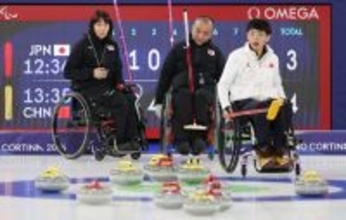 見守る小川、中島組