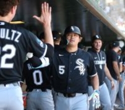 迎えられる村上　大リーグ