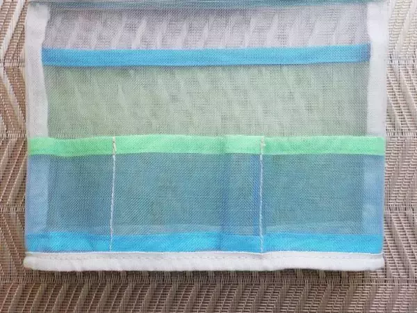 「何を入れてもかわいくなっちゃう！ ファミマカラーの「メッシュポーチ」が優秀すぎ。ストレンジャー・シングスとのコラボも」の画像