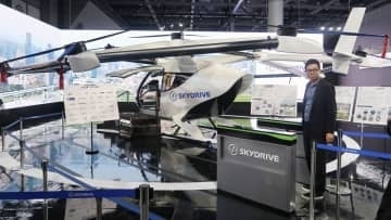 空飛ぶクルマの搭乗口乗車を体験 愛知、自動改札機も併せ展示