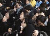 「韓国の航空機事故1年で追悼式典　務安で179人死亡、原因未解明」の画像1