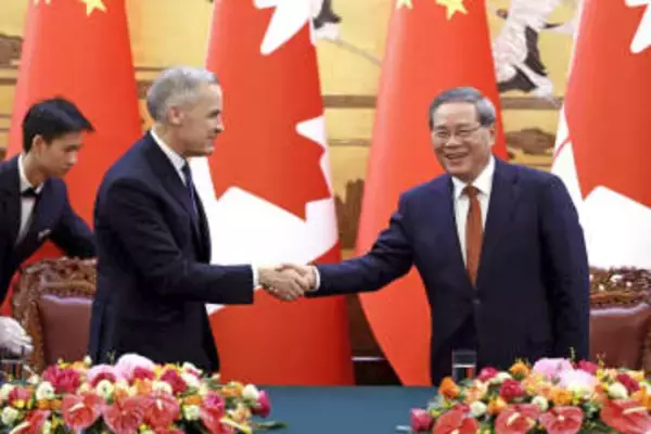 中国とカナダの首相、北京で会談　関係改善で貿易拡大図る