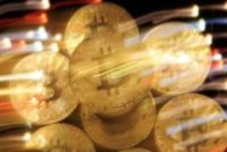 仮想通貨所得の税負担減　株式と同等20％、政府検討