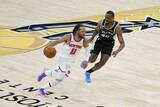 「NBA決勝、ニックスが先勝　第1戦、スパーズに」の画像1