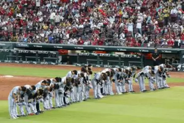 阪神、球団初のセ・リーグ連覇　巨人との大接戦制す、8度目V