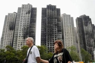 168人死亡香港火災、7人起訴　補修会社幹部ら過失致死罪