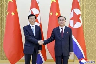 中国高官、金正恩氏の側近と会談　友好条約65年で経済、文化協力