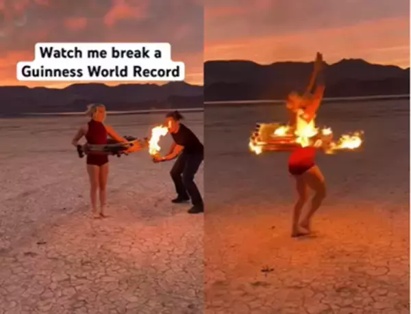 燃える8本のフラフープを同時に回転させる世界記録