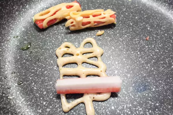 「【SNSで大バズり】ホケミで簡単♪「揚げないアメリカンドッグ」作ってみた！罪悪感ナシだから食べ放題♡」の画像