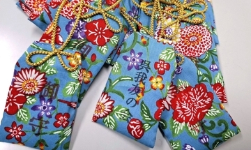 地元の米と塩で手作りお守り　交通安全願い320個を区民に配る　沖縄・名護市