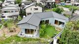 「180坪“訳あり物件”に建てたCの字ハウス、夫妻の理想を実現【住人十色】」の画像1