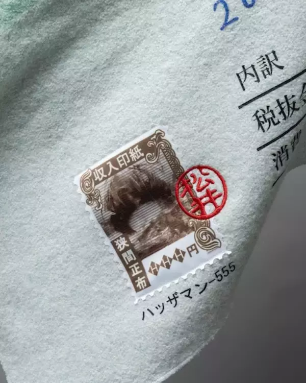 「経費で落ちますか？ぜひとも埋もれてみたい「領収書マフラー」が話題」の画像