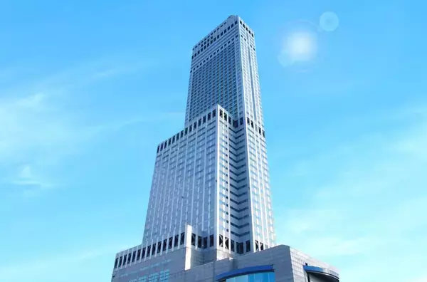 「地上28階のルーフトップビアガーデン　発着する飛行機と都市の明かりと」の画像