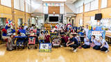 「沖縄市との地域連携事業 琉球ゴールデンキングス・佐土原遼選手、ゴーディーが沖縄中部療育医療センターを訪問」の画像1