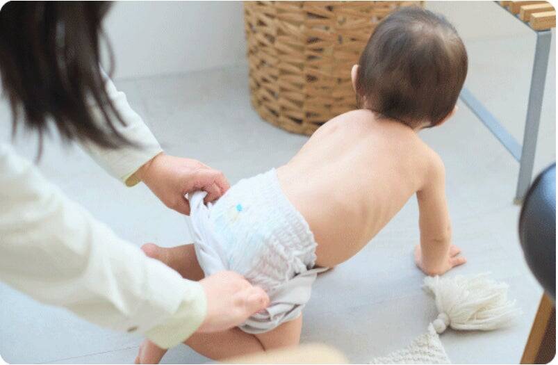 ロンパースのお着替えを変える新発想。ーバイヤーの開発への想いを綴るー