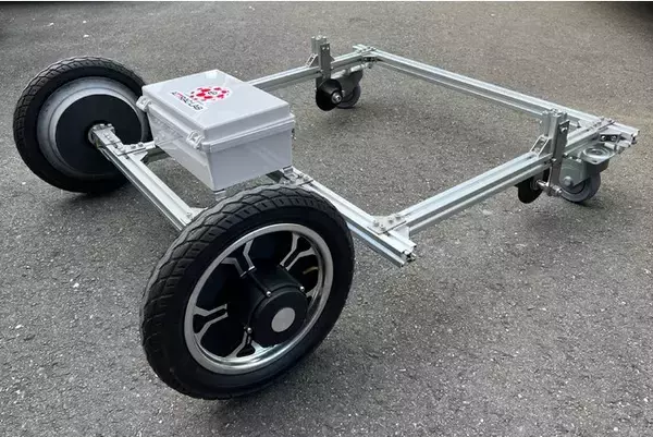 ビニールハウスなどに設置されたレール上を、自動走行する汎用電動台車を開発