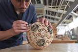 「木組みだけで実現した球体型の組子細工「KUMIKO SPHERE」を発表― 天皇杯 JFA 第106回全日本サッカー選手権大会の公式ビジュアルにも採用 ―」の画像1