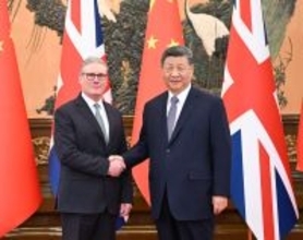 習主席、英国首相と会談