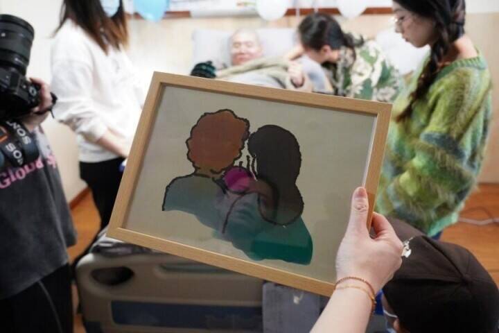 麻痺患者がBMI技術で再び筆を握れるように―中国